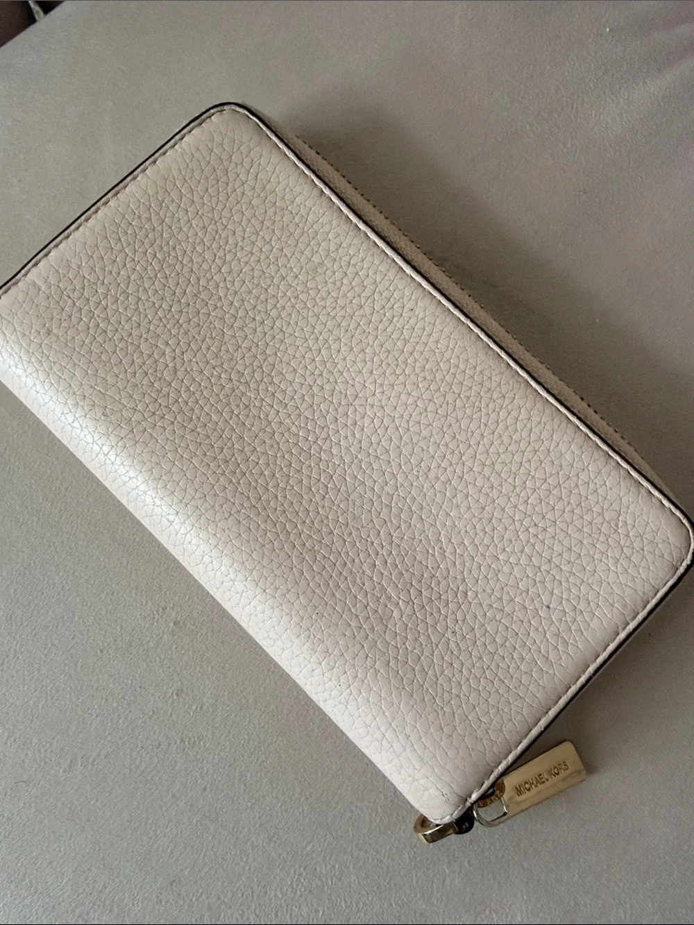 Michael Kors Pebbled Zip Wallet in Cream with Gold Hardware